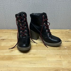Women’s heeled boots with red laces